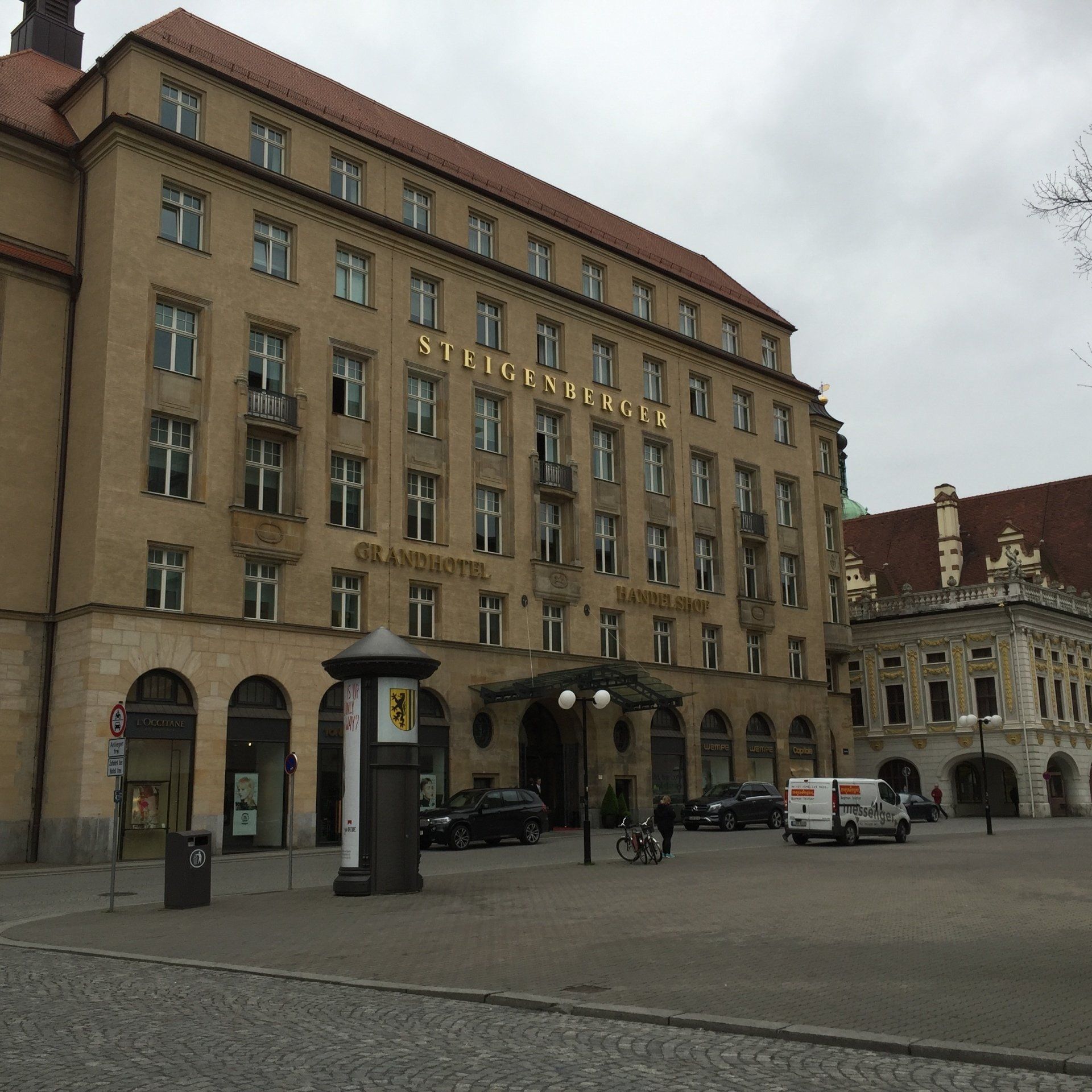 A large building with a sign that says ' s. fleischer ' on it