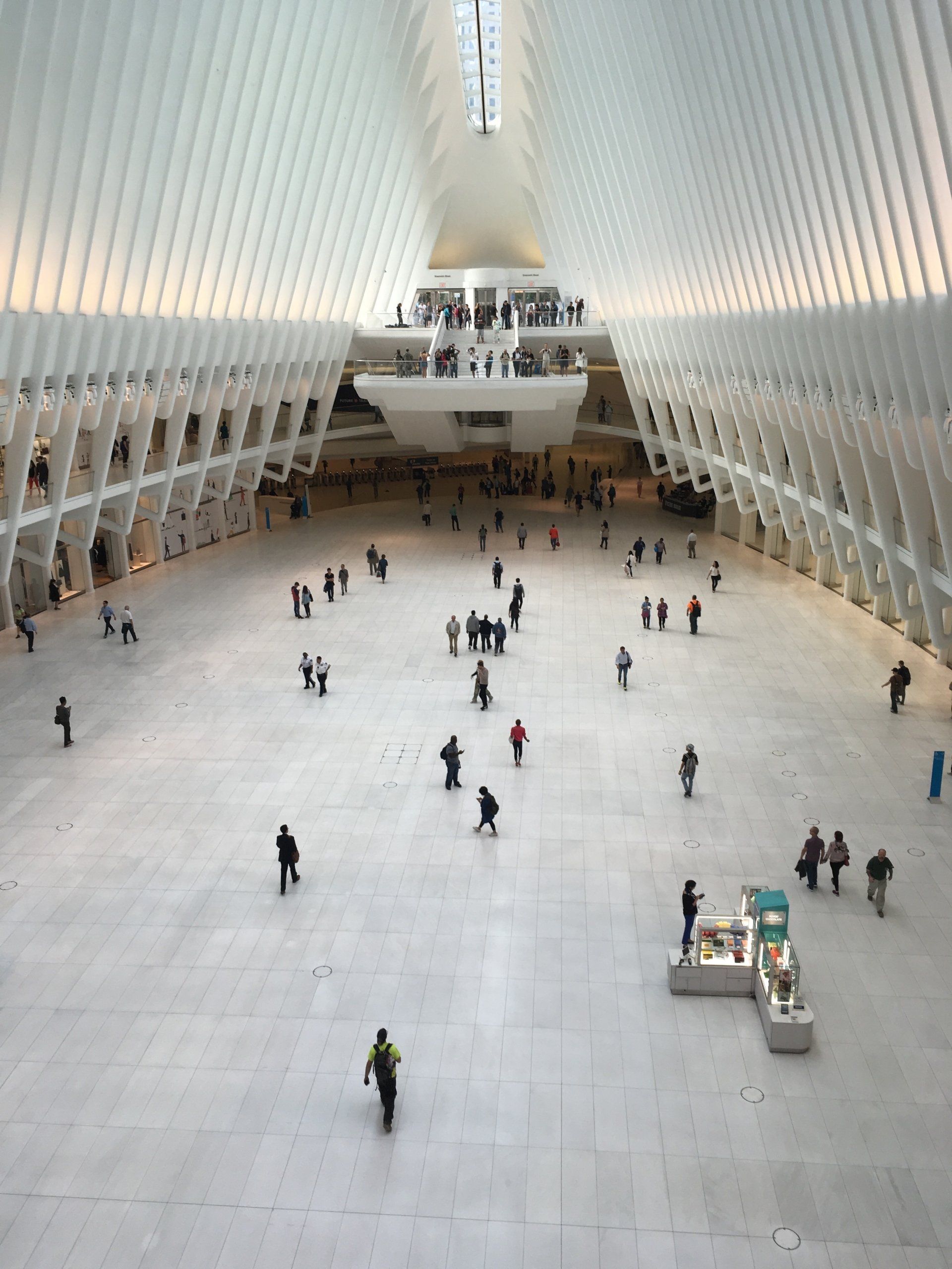 A large building with a lot of people in it