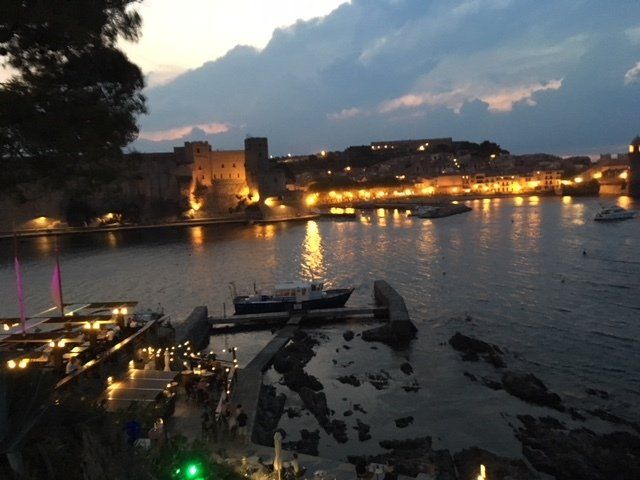A large body of water with a city in the background