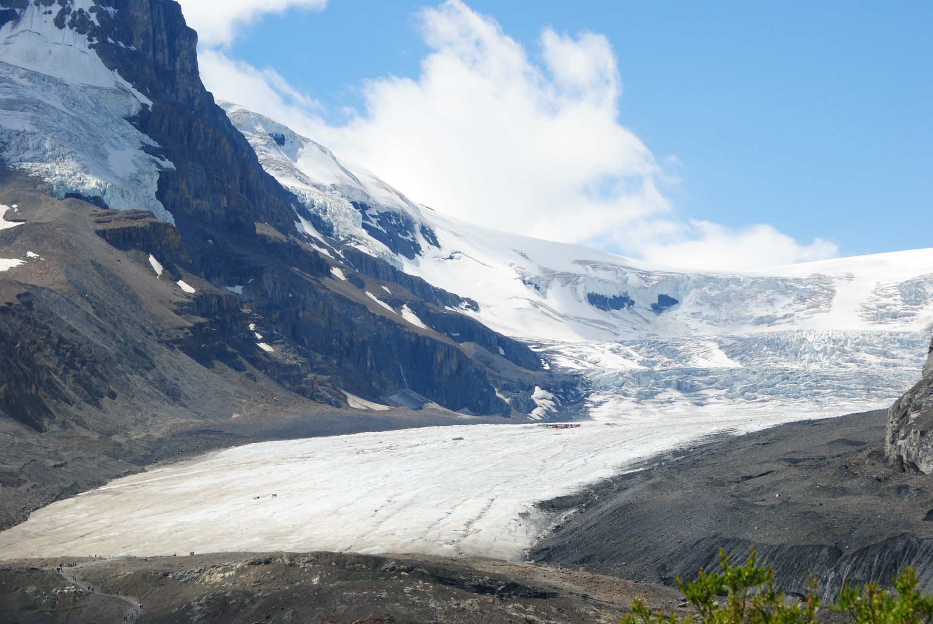 A large glacier in the middle of a mountain range
