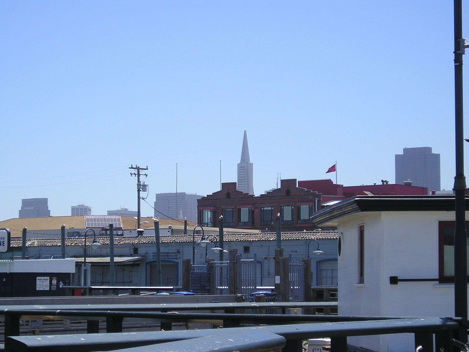 A view of a city with a tower in the distance