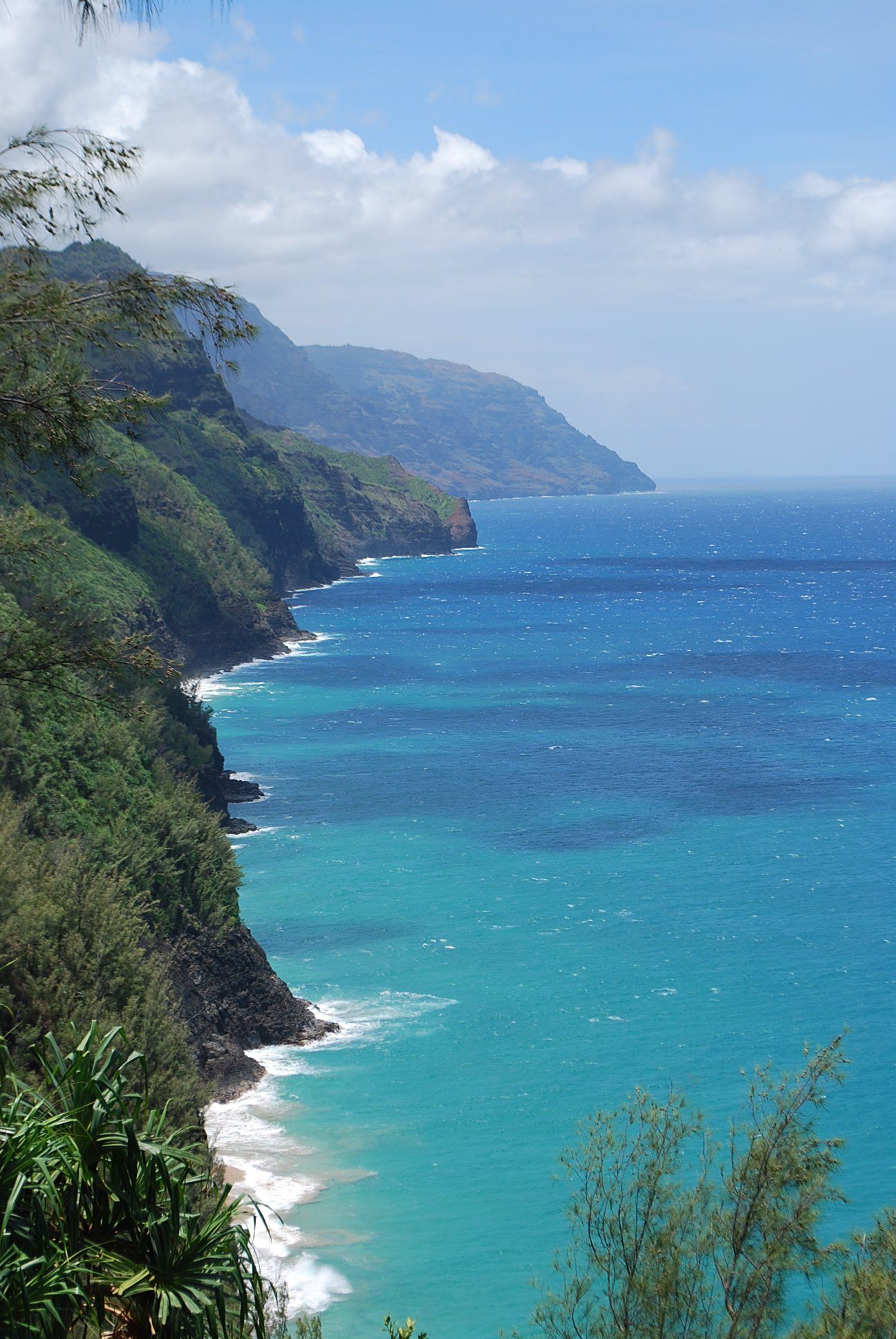 A view of a cliff overlooking a body of water