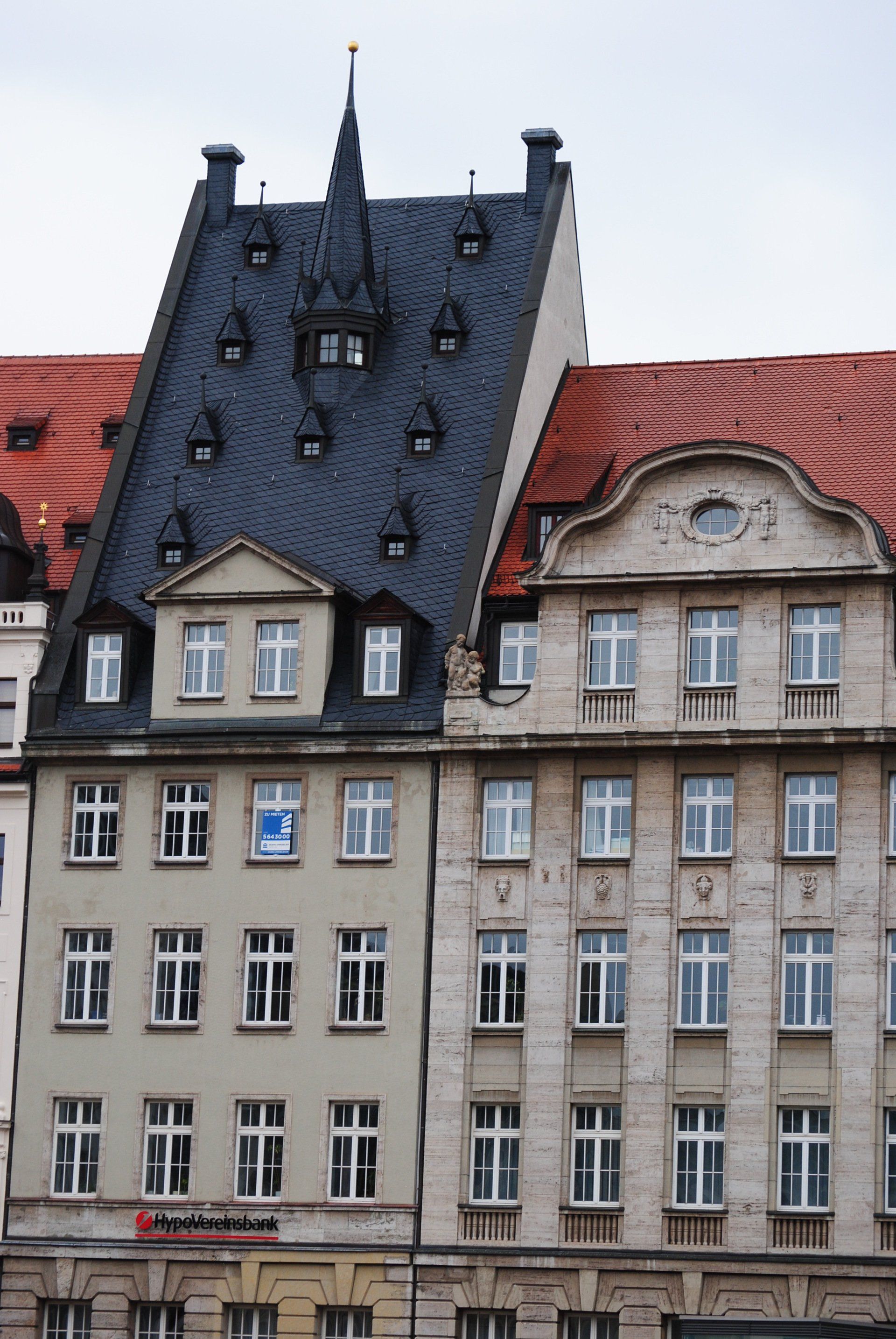 A building with a clock on the top of it