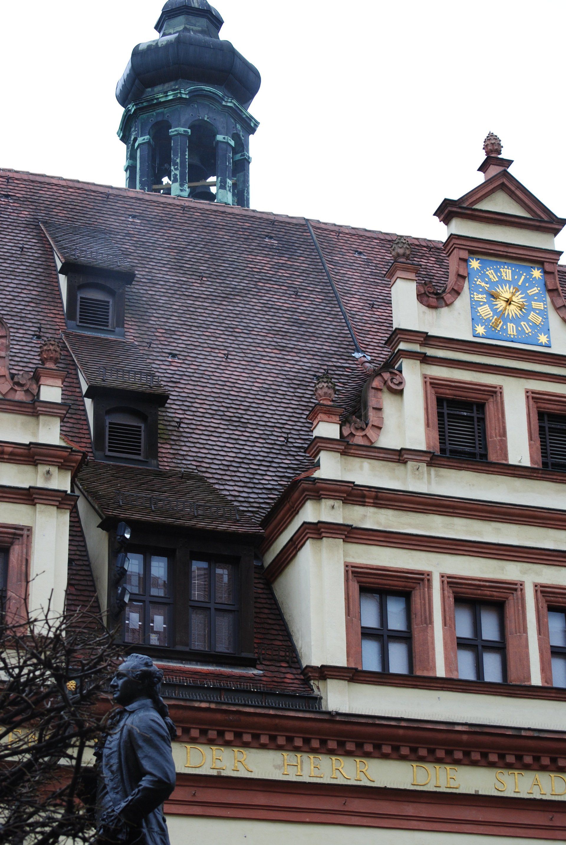 A large building with a clock on top of it