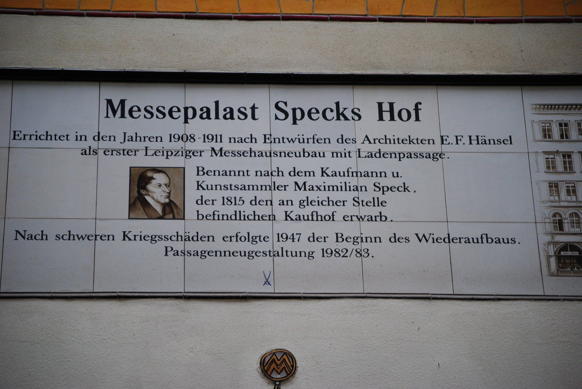 A sign on a wall that says messepalast specks hof