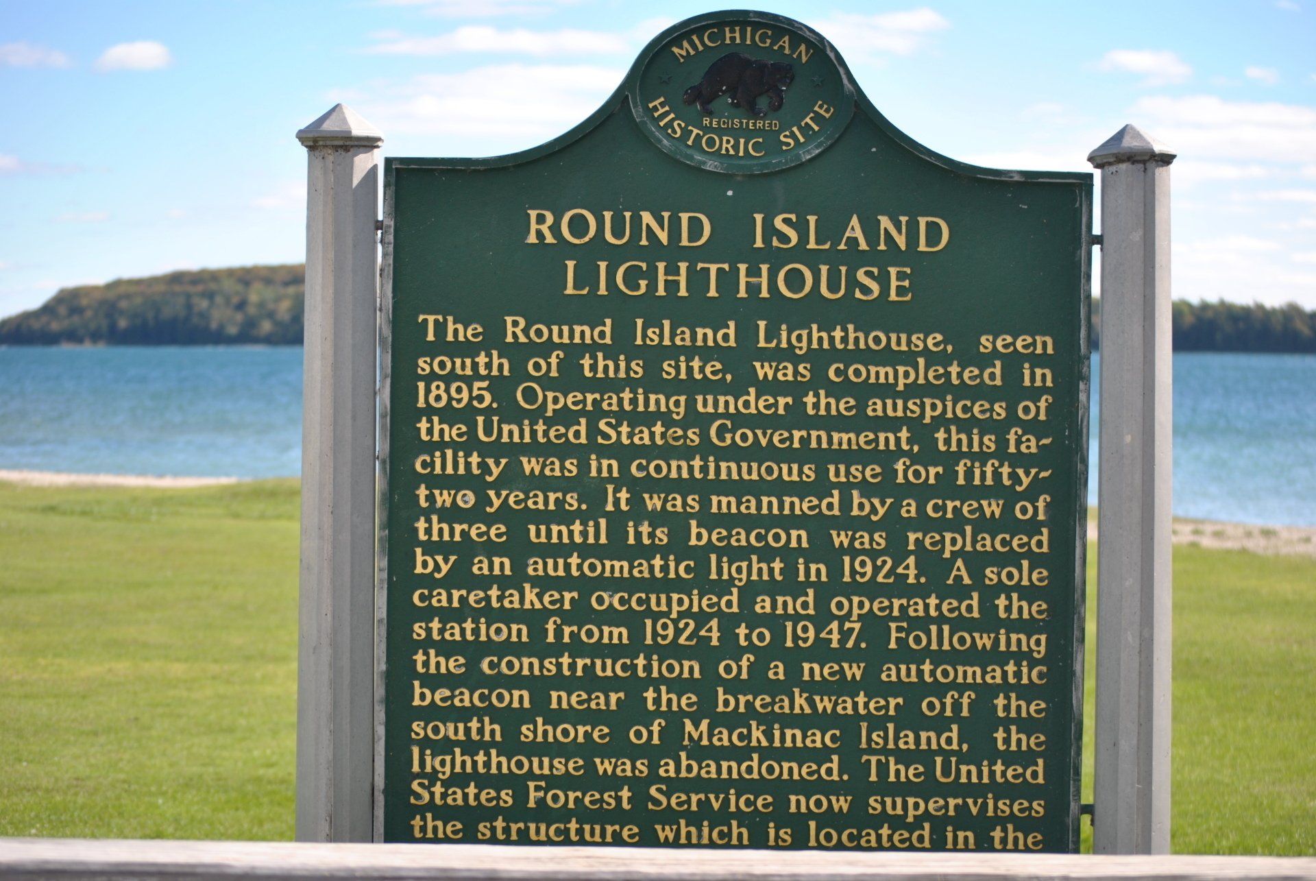 A historical marker for round island lighthouse in michigan