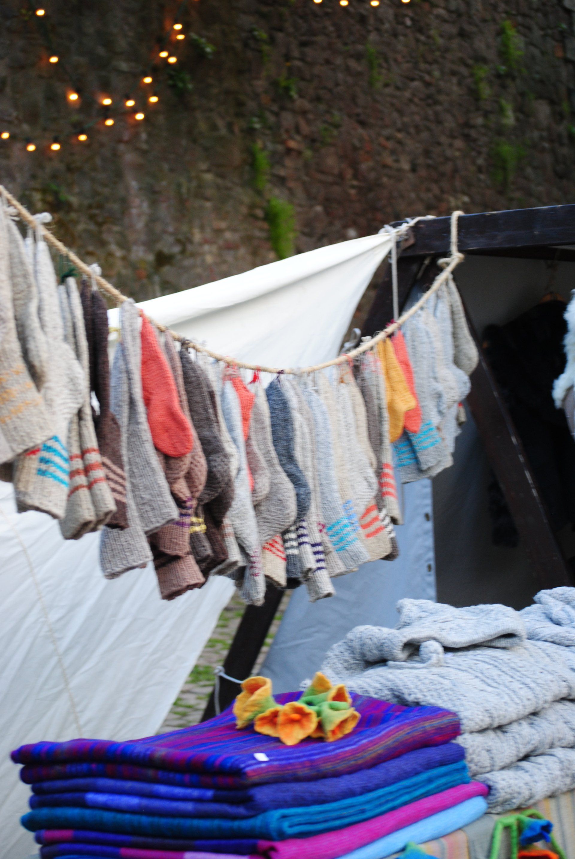 A bunch of towels are hanging on a clothes line
