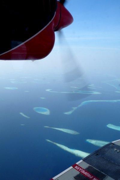 The word propeller is on the side of a plane