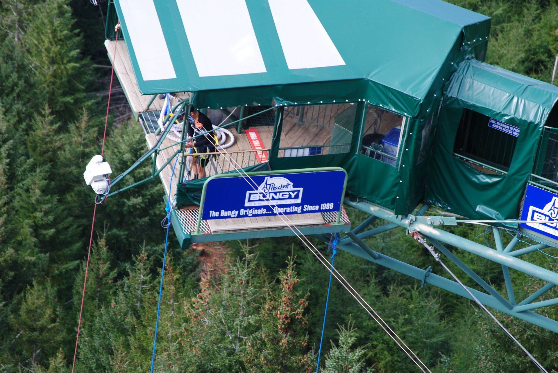 An aerial view of a bungee jump in the woods