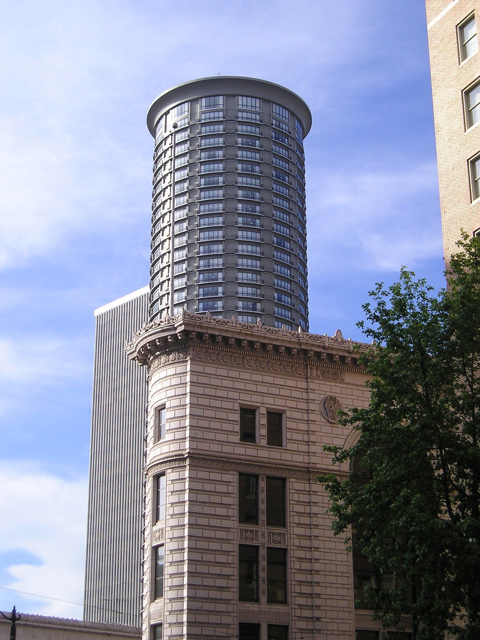 A tall building with a sign that says ' a ' on it