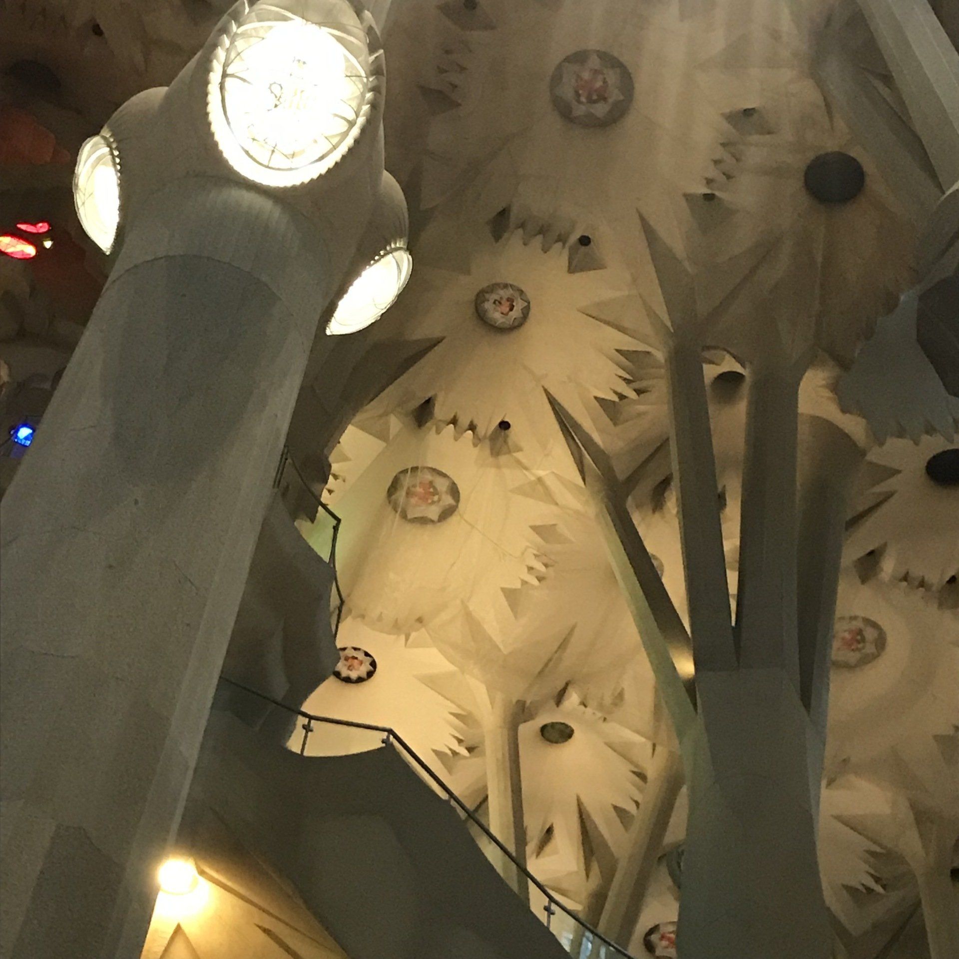 A staircase leading up to the ceiling of a building