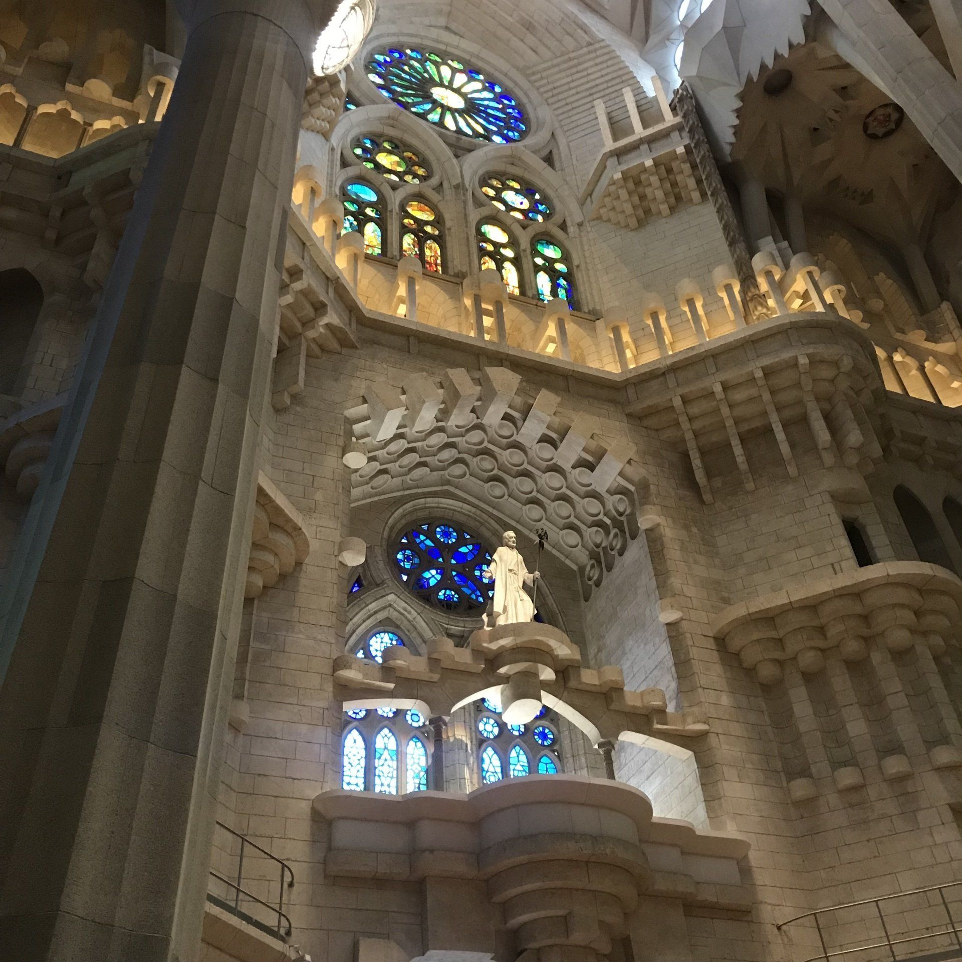 The inside of a church with stained glass windows