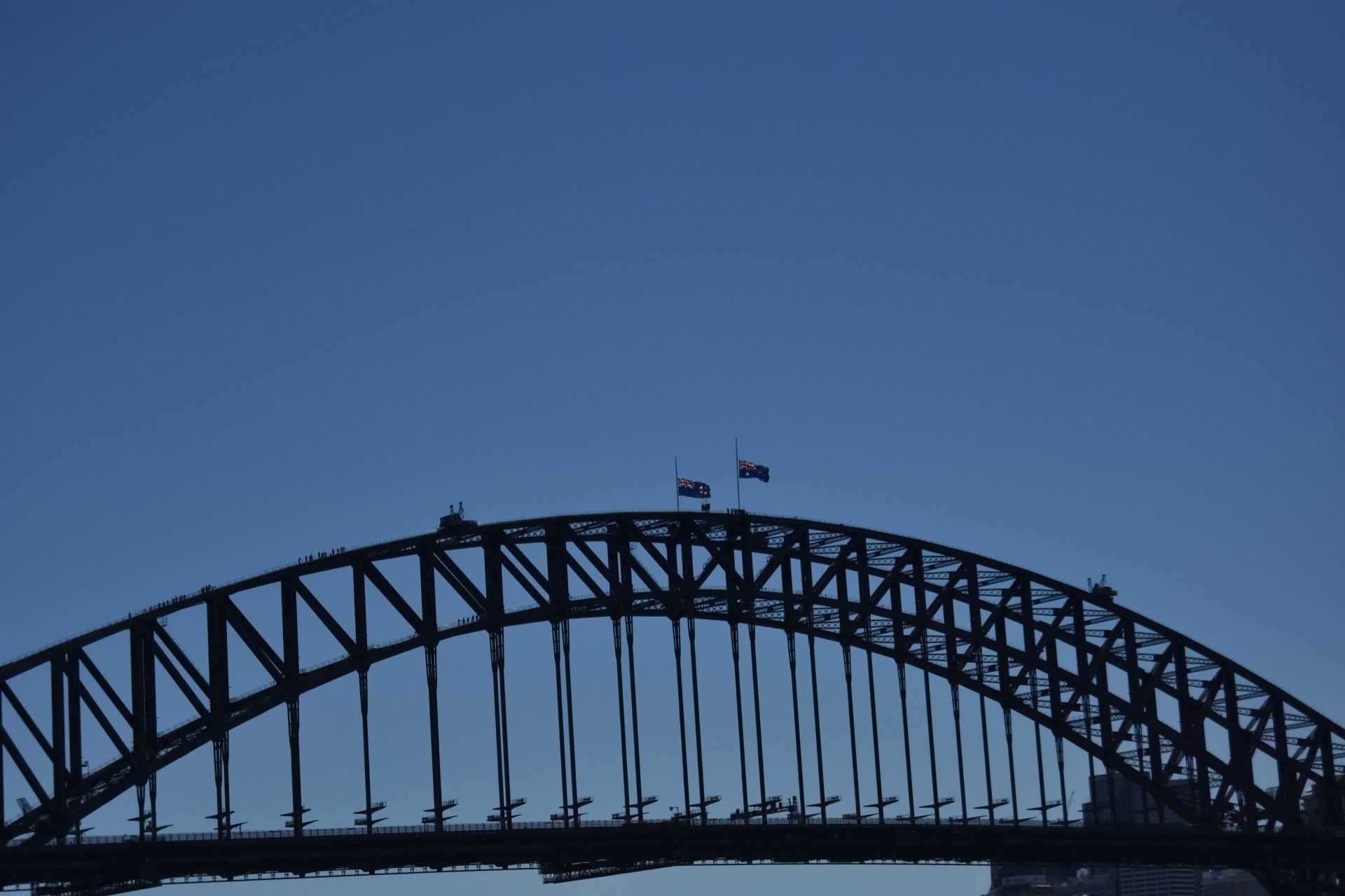 A bridge with a blue sky in the background