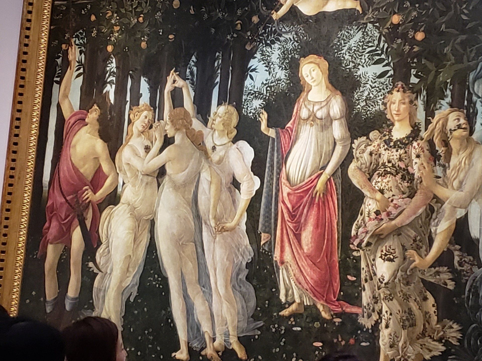 A painting of a group of women standing next to each other