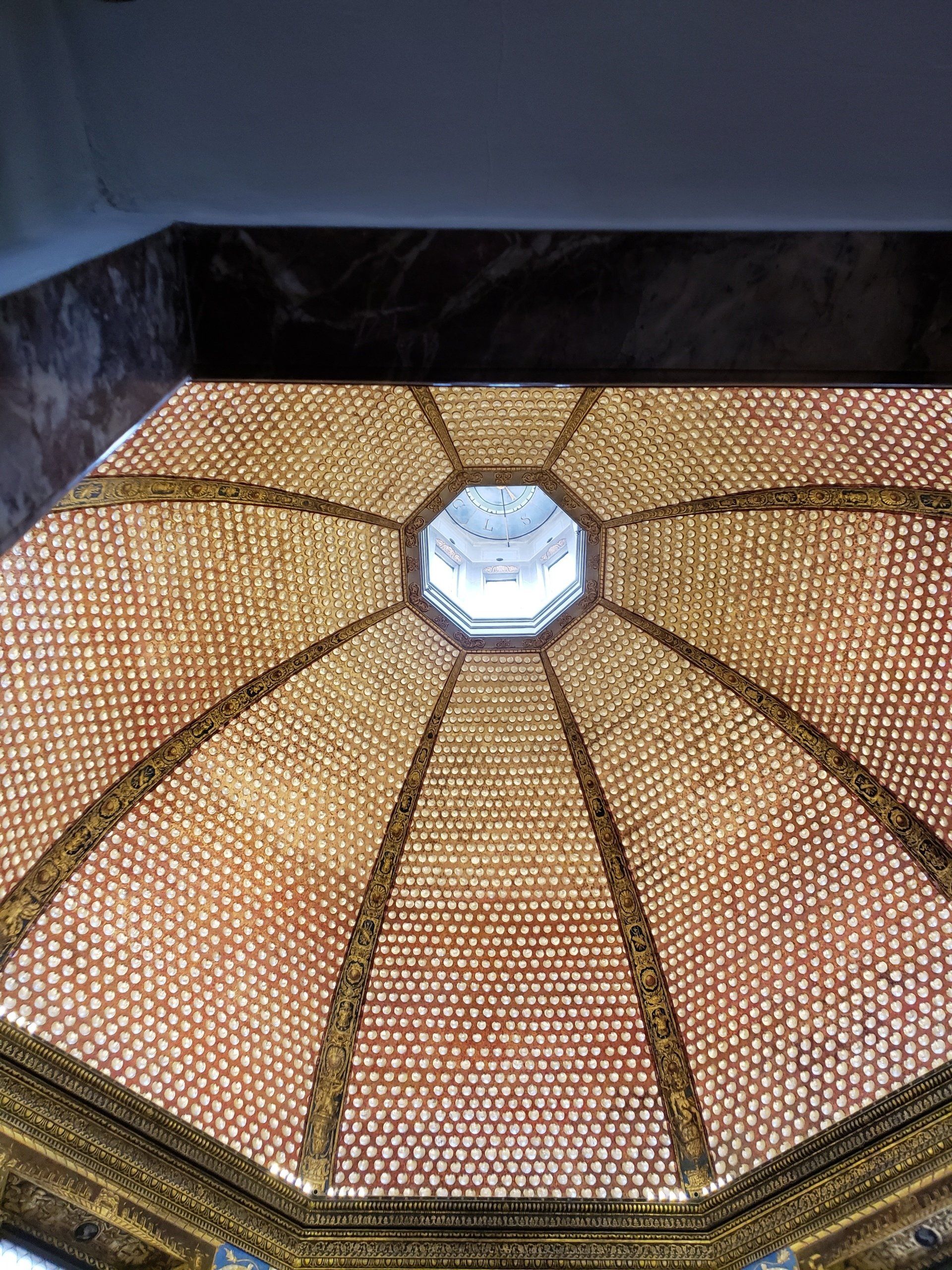 A dome with a light in the middle of it.