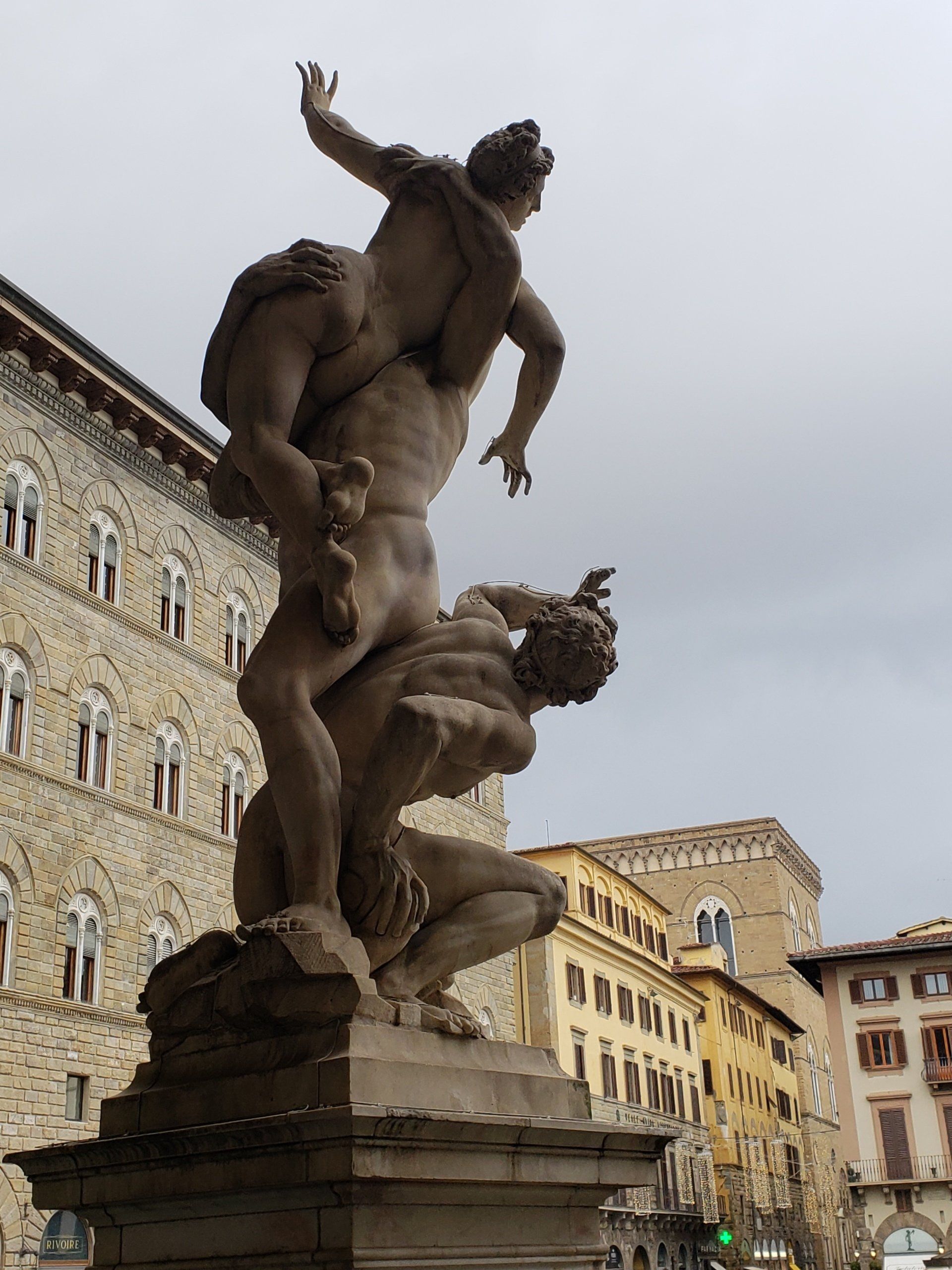 A statue of a man carrying another man on his shoulders