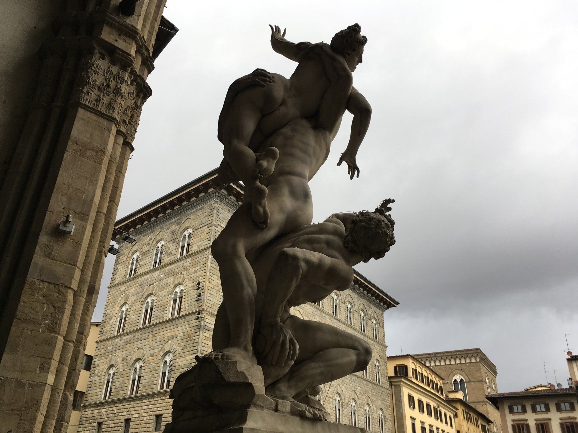 A statue of a man carrying another man on his shoulders