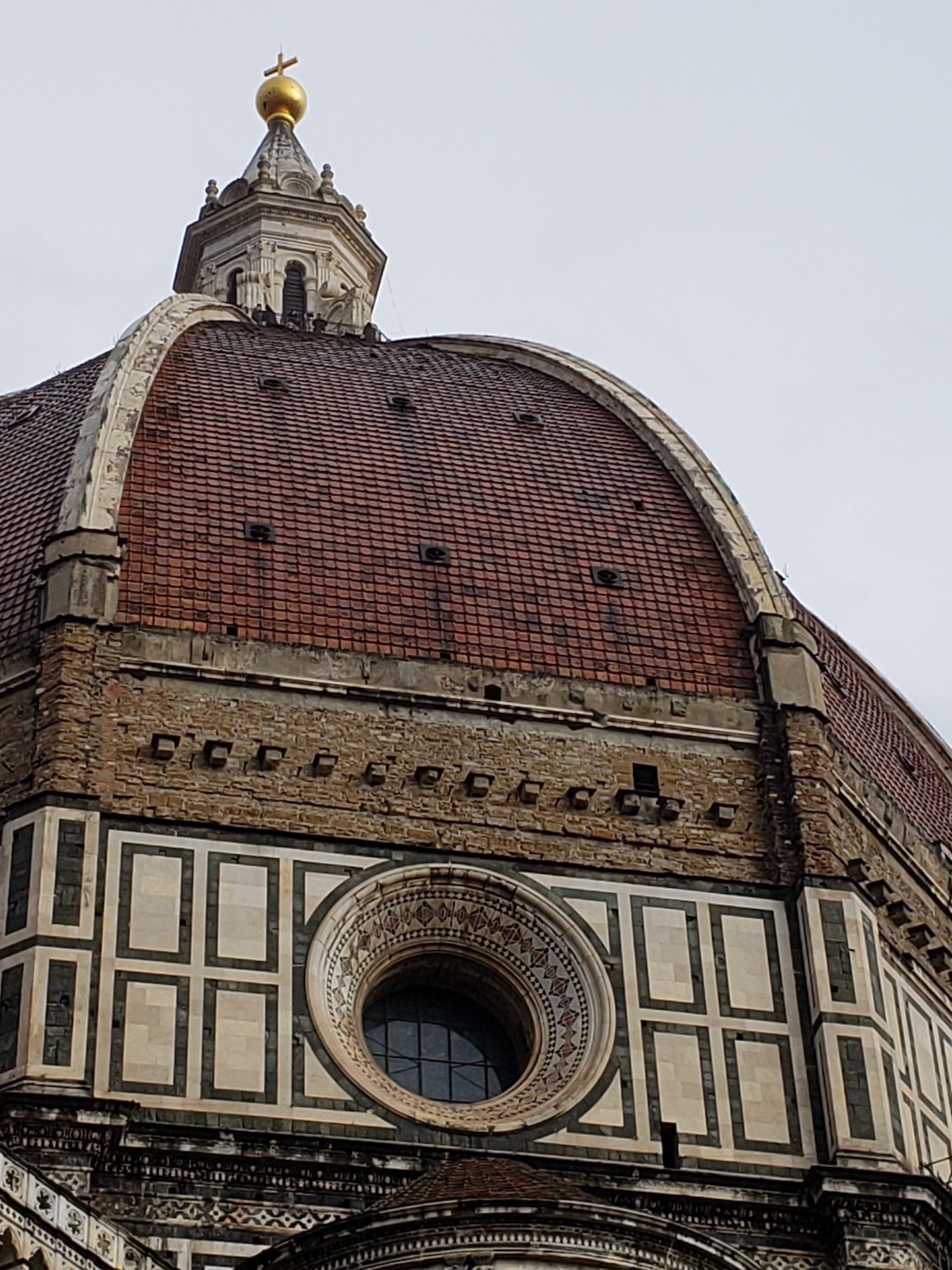 A dome on top of a building with a window