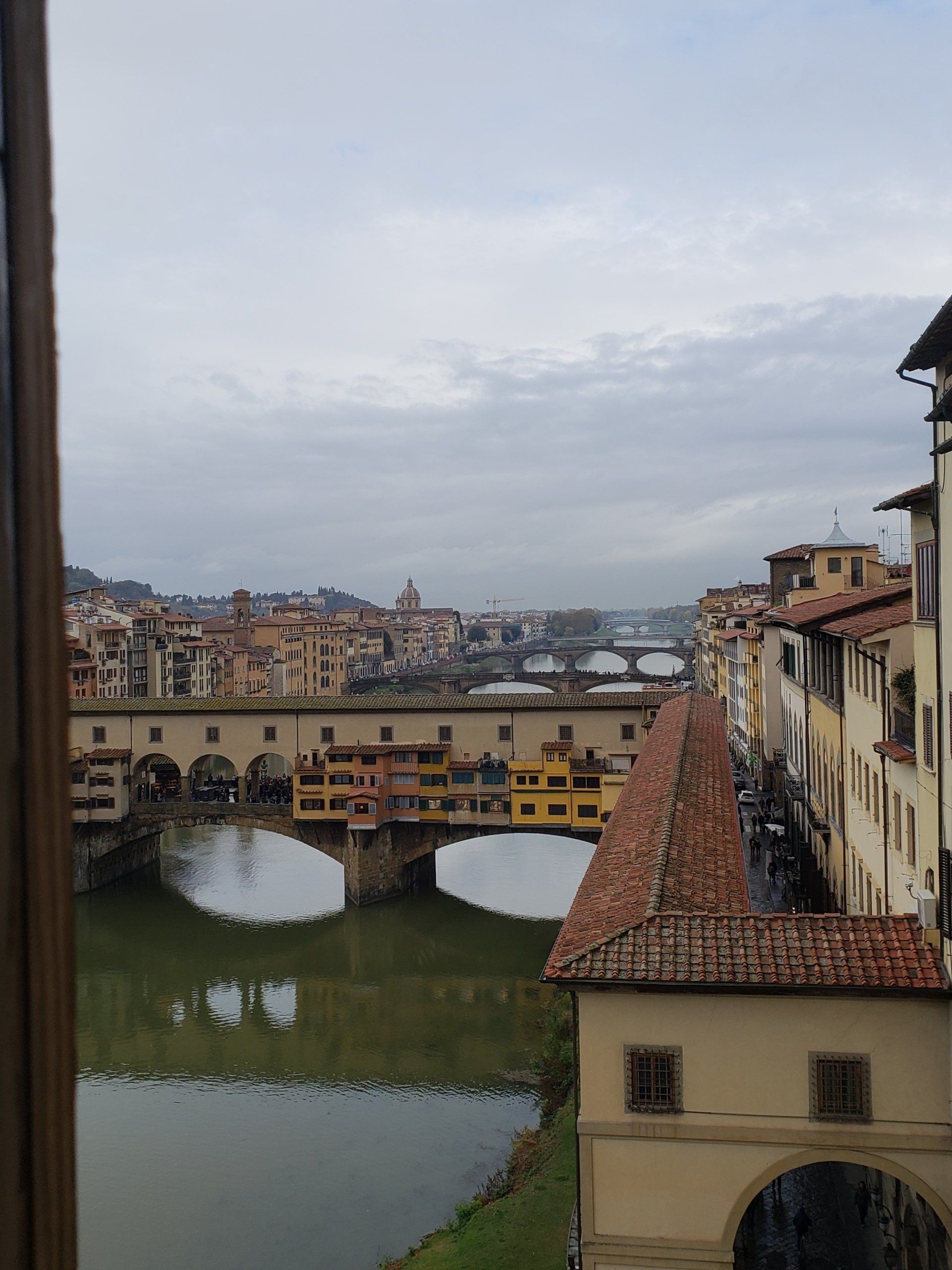 A view of a bridge over a river in a city