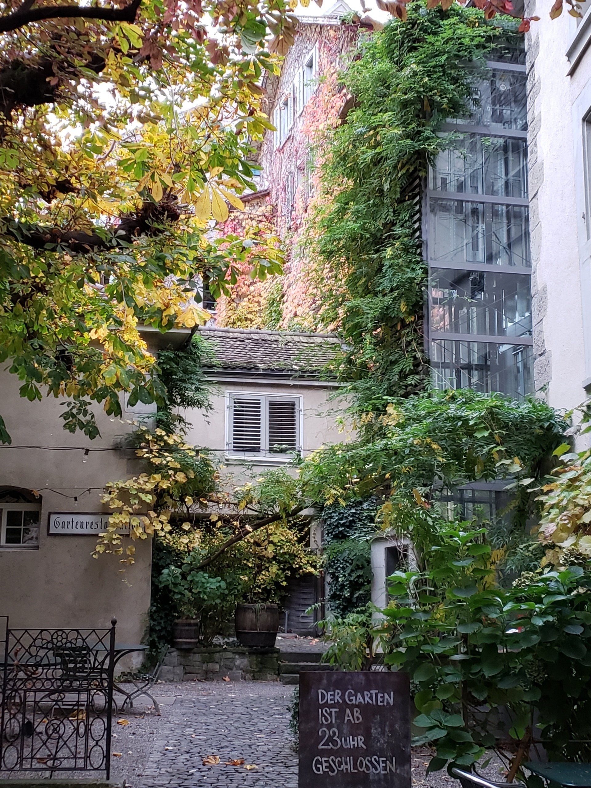 A building with a sign in front of it that says ' elevator ' on it.