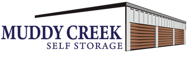 The logo for tower mini storage is black and white.