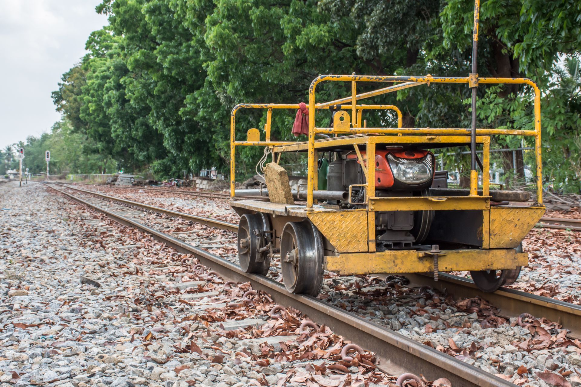 worker car on small rail track