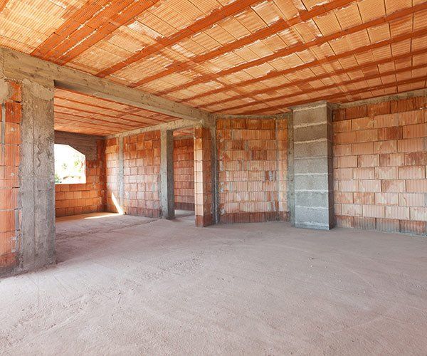 space with orange brick being remodelled