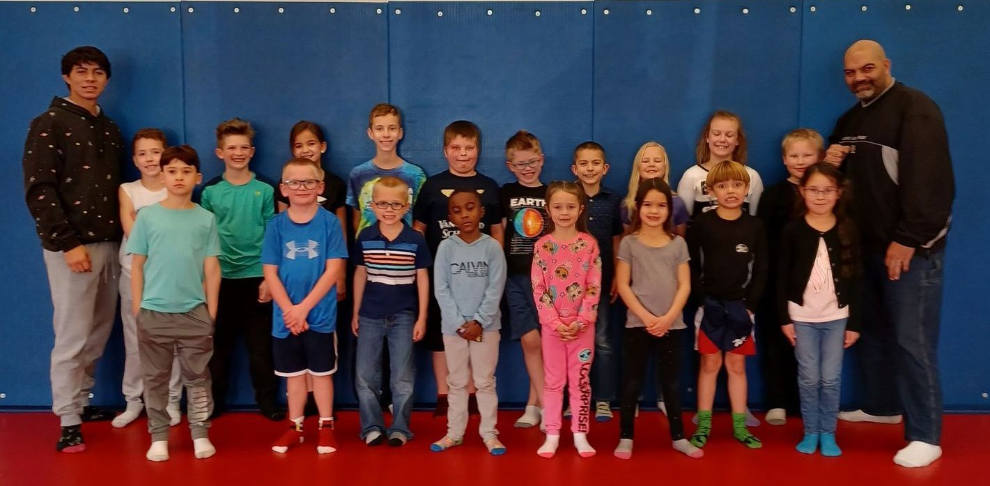 A blurry picture of a bunch of colorful lights on a dark background.