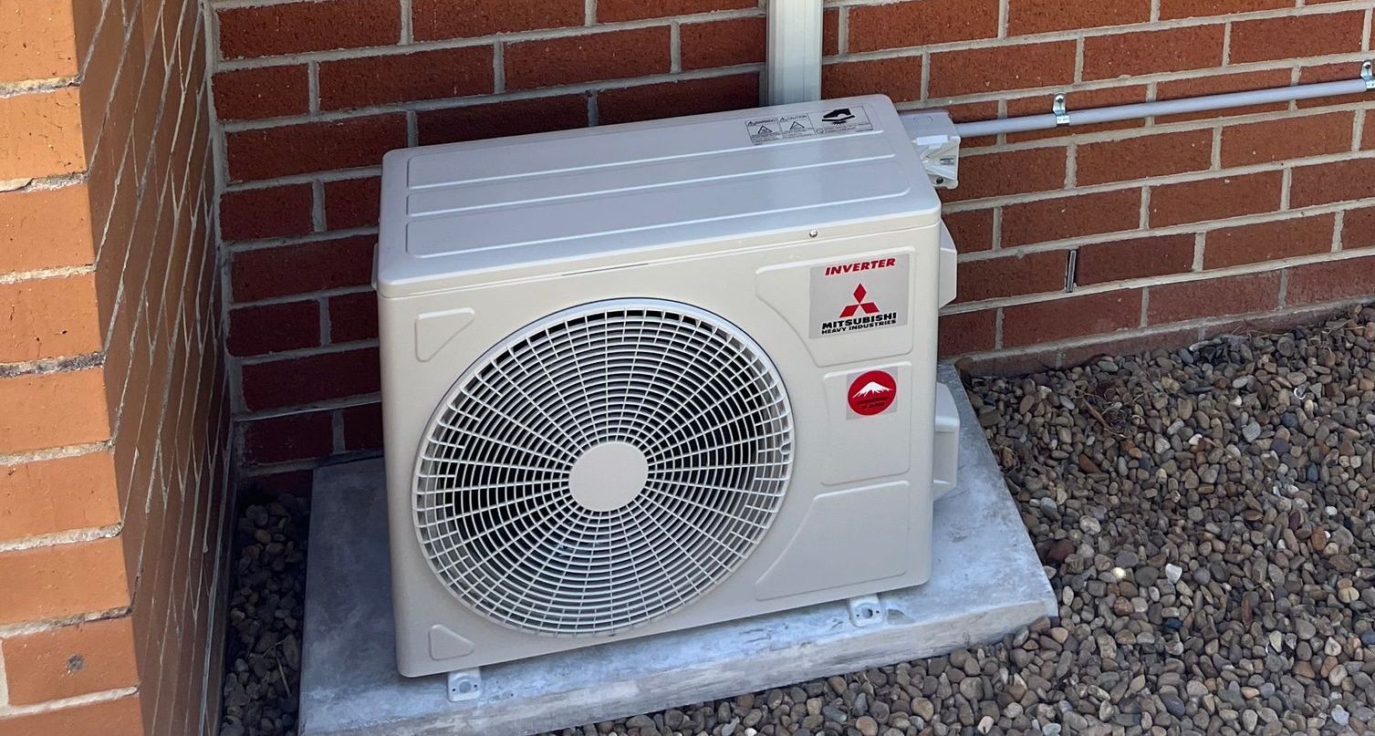 A close up of a fan with a white circle in the middle — Steve's Air Conditioning in Warrawong, NSW