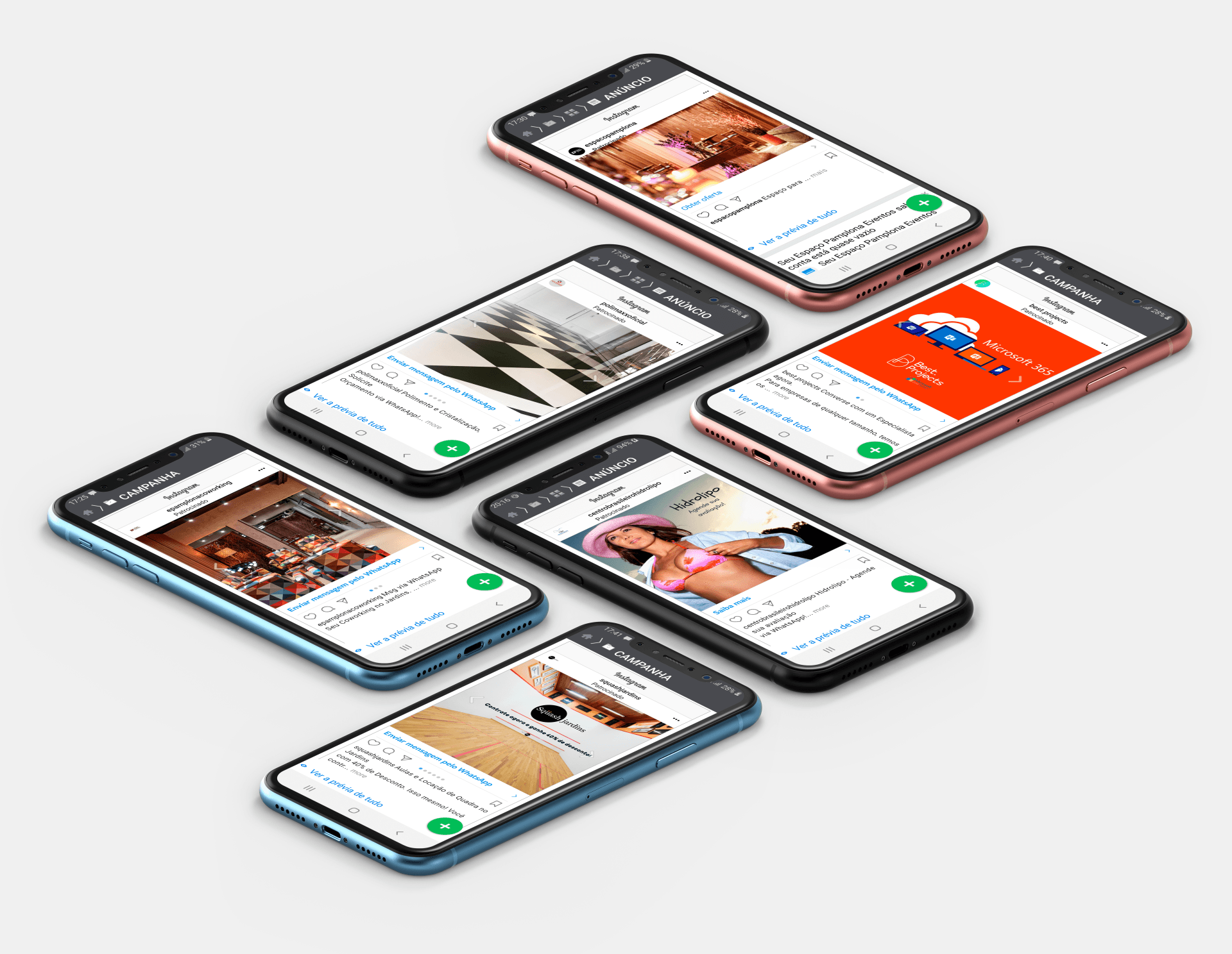 Um grupo de smartphones está um em cima do outro em uma superfície branca.
