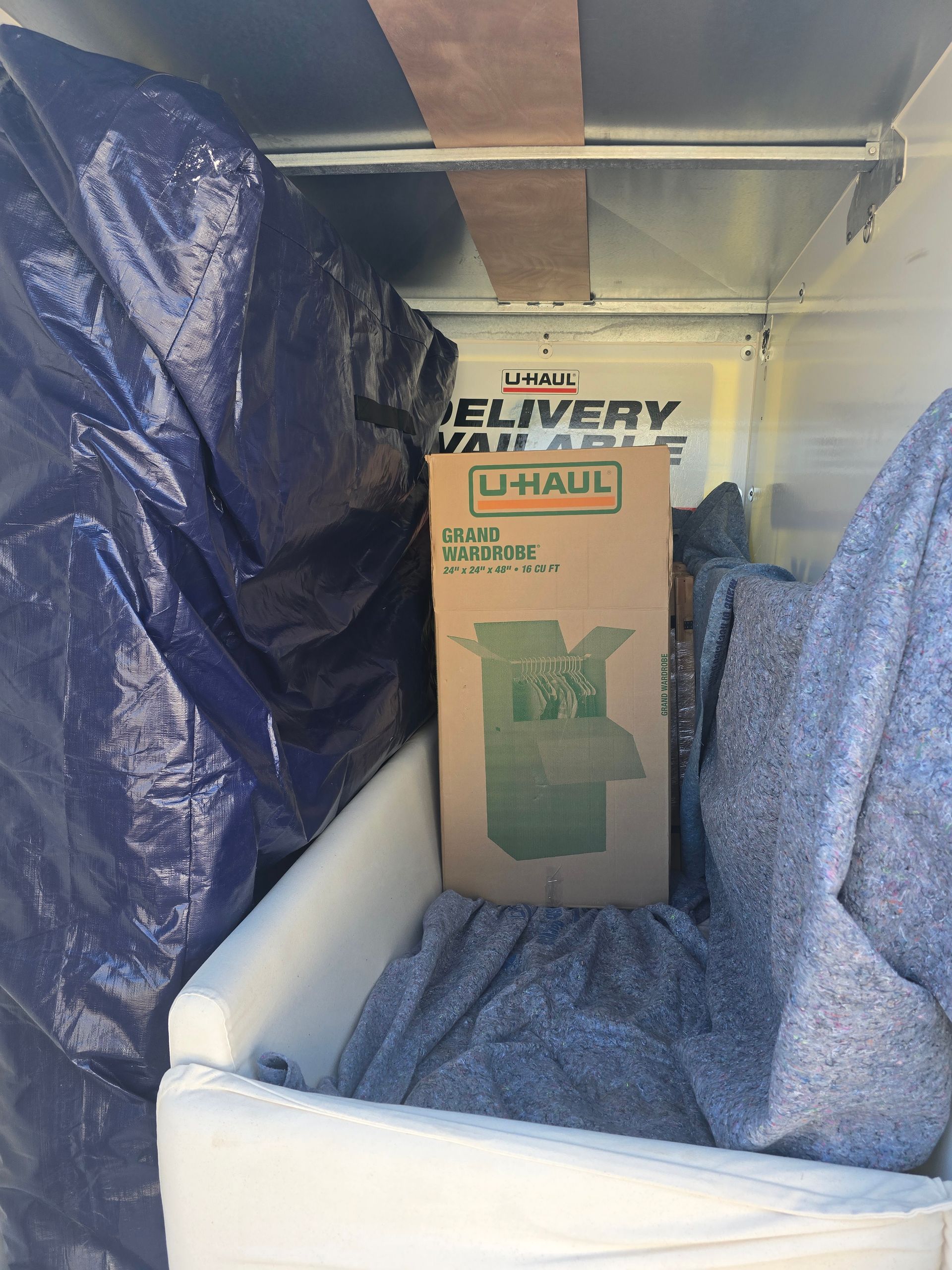 A cardboard box with the word uhaul on it