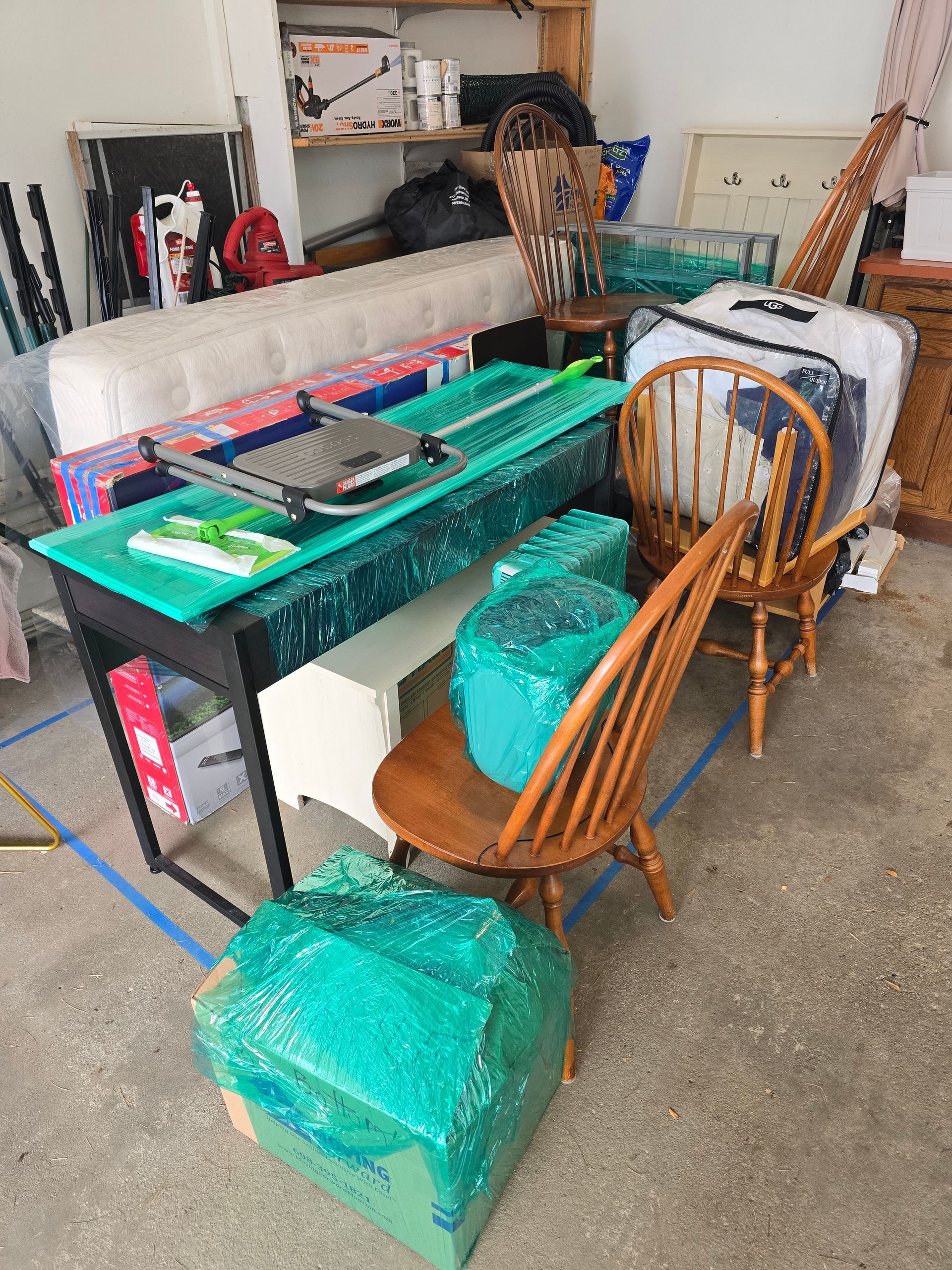 A room filled with lots of furniture and luggage.