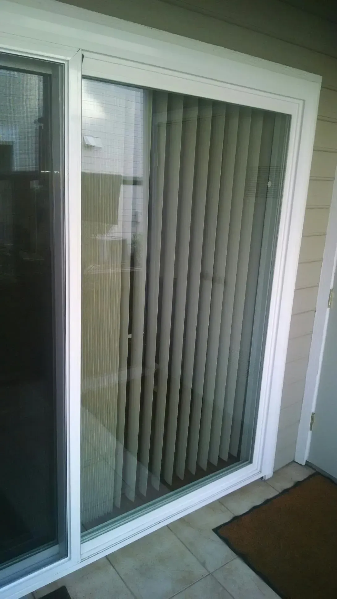 Sliding Glass Door with Vertical Blinds — Corona, CA — Corona Glass, Inc.