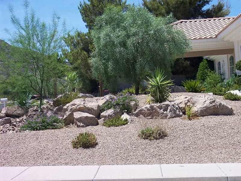 Gravel and Shrubs in Front of House - Custom Landscaping Services in Henderson, NV