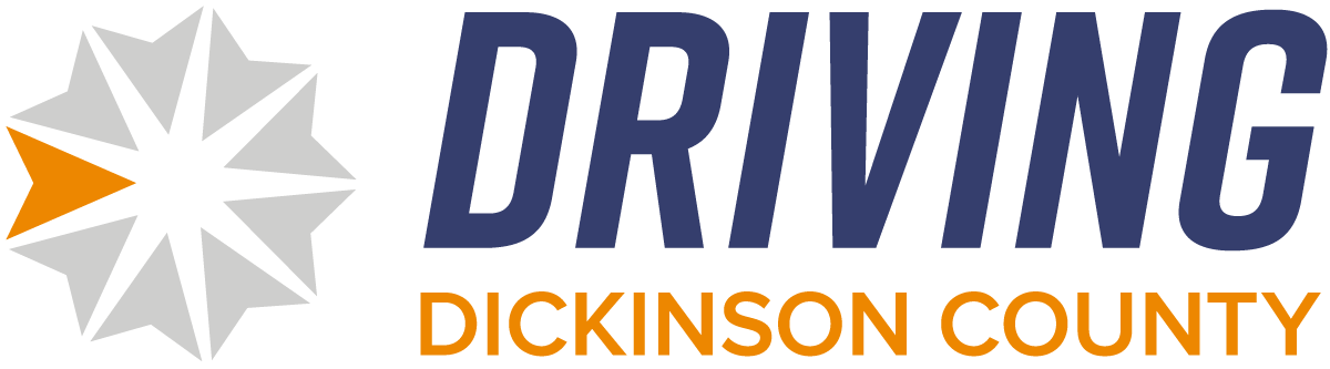 A logo for driving dickinson county with a star and arrow