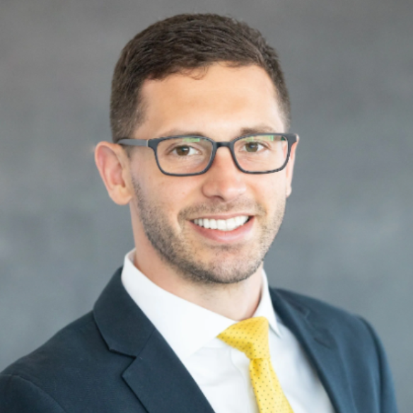 A black and white drawing of a man wearing glasses and a suit and tie.