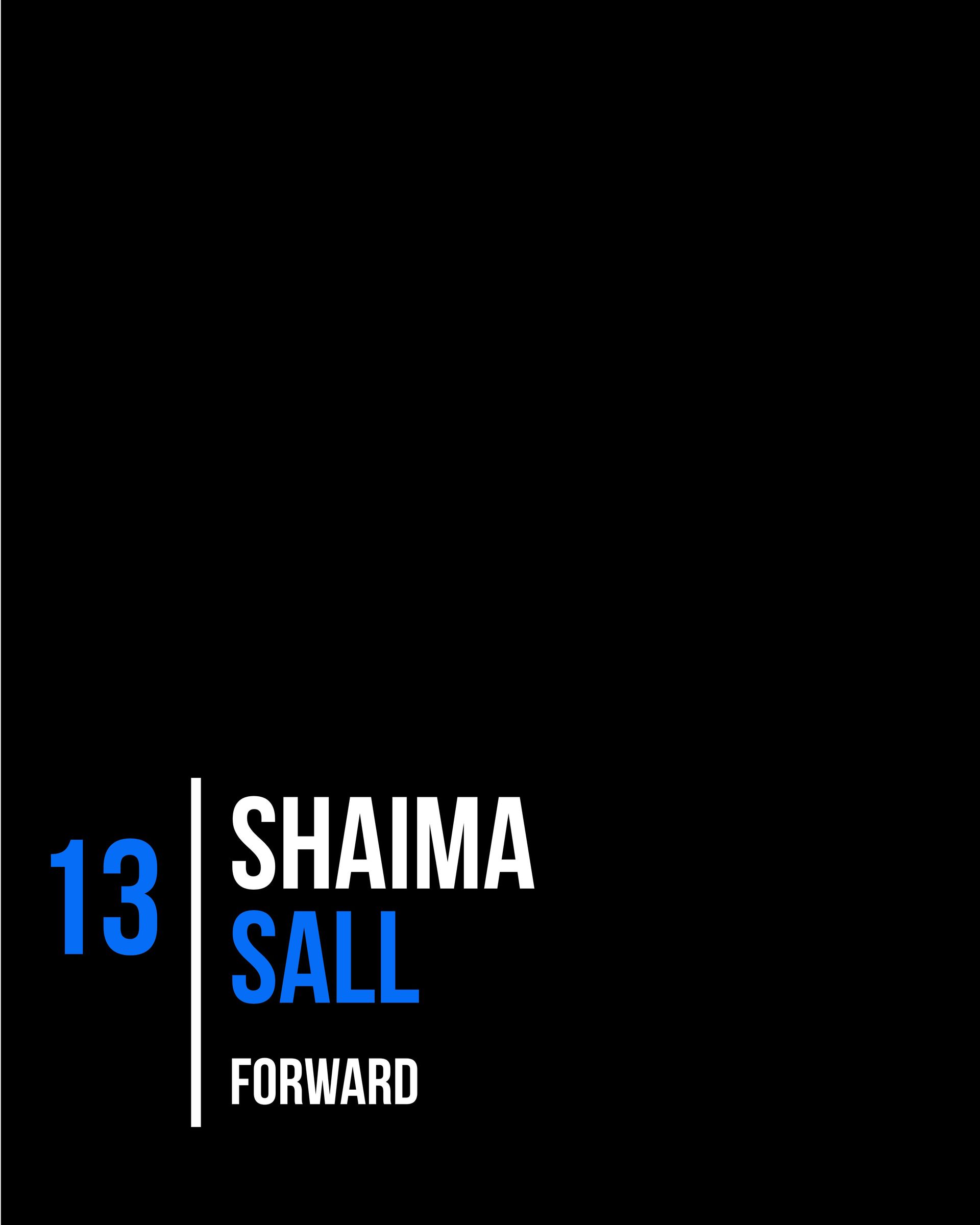 Basketball player Kiera Williams in a blue uniform, holding the ball, preparing to play on the court.