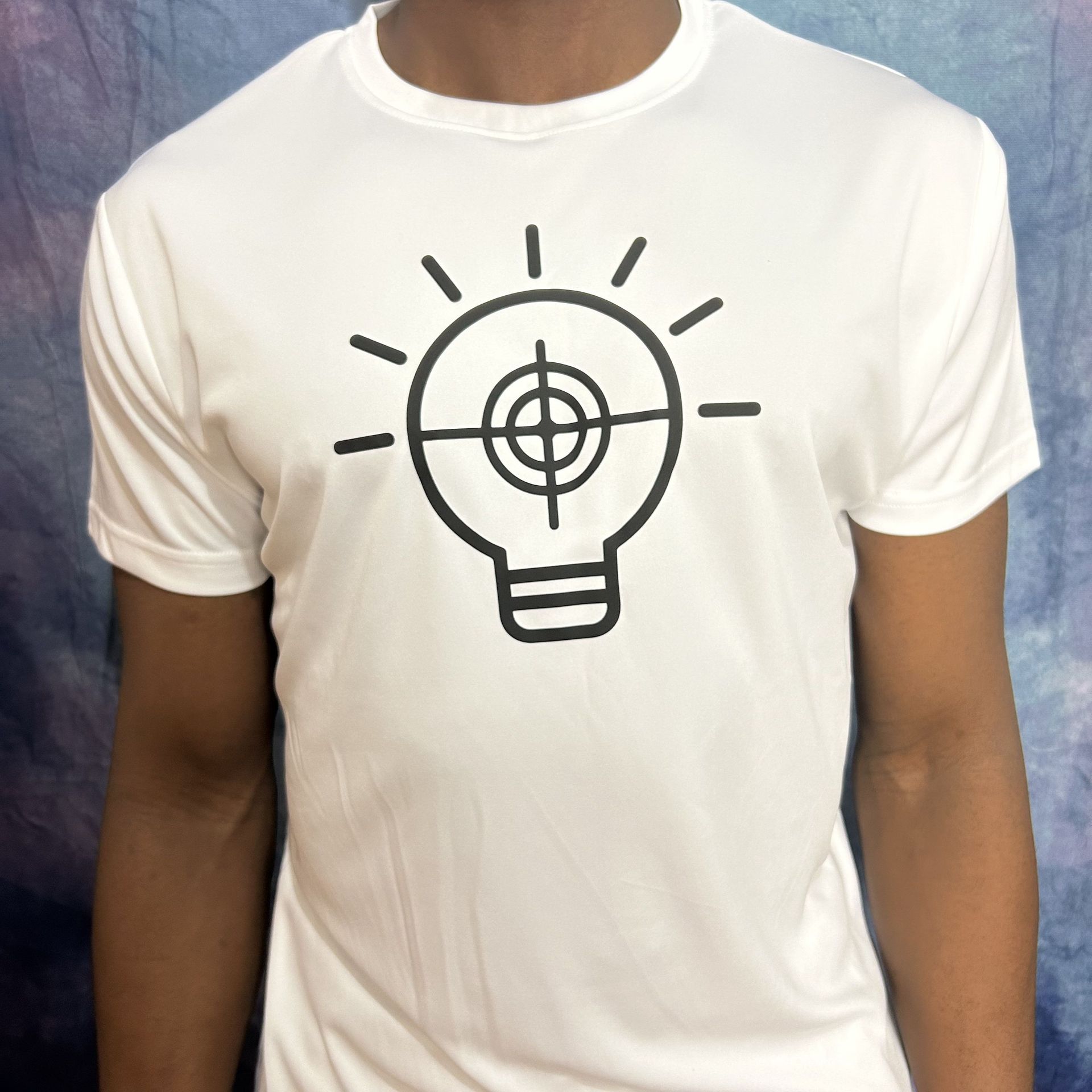 White t-shirt with black lightbulb graphic, the bulb containing a target.