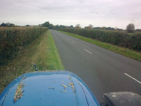 Front of a blue tractor