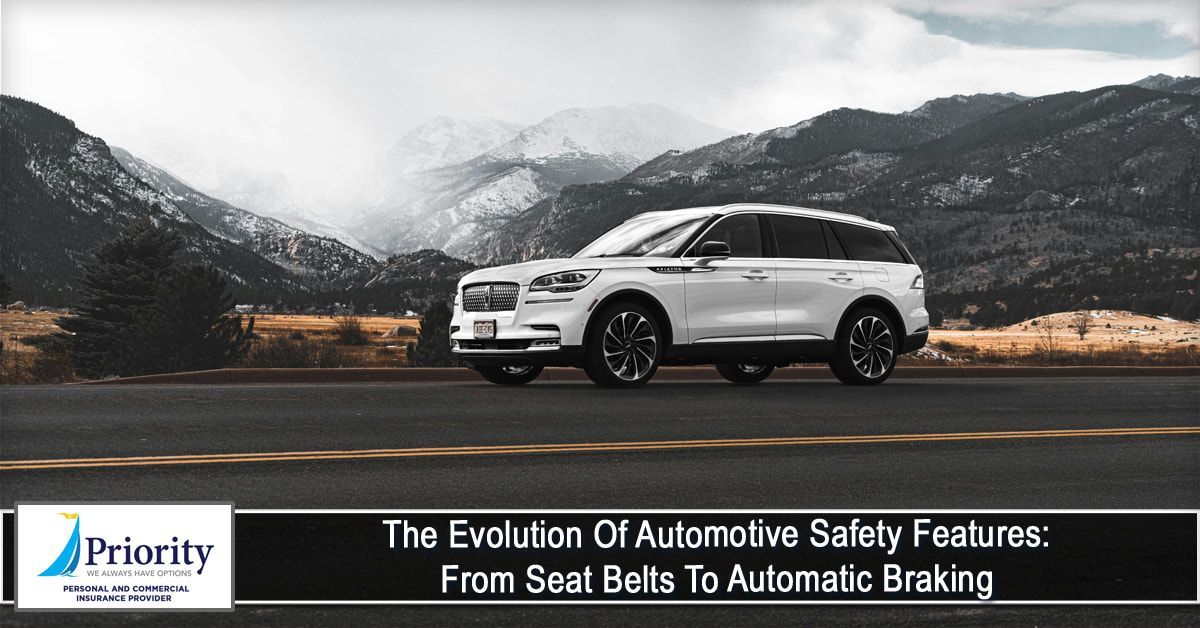 The evolution of automotive safety features from seat belts to automatic braking