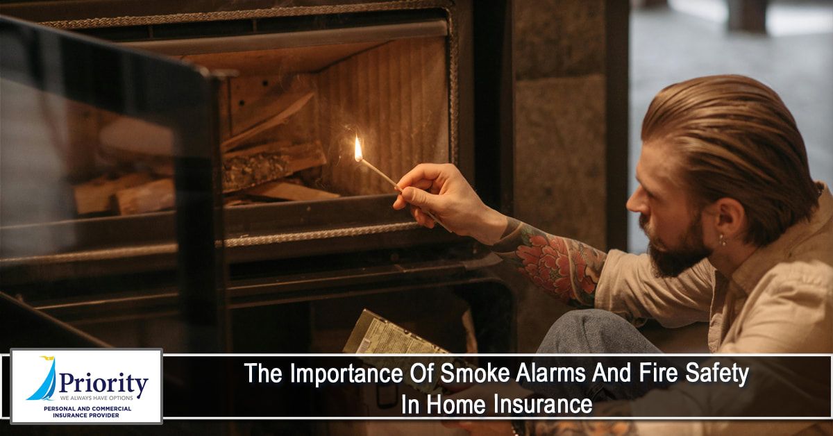 A man is lighting a match in a fireplace.