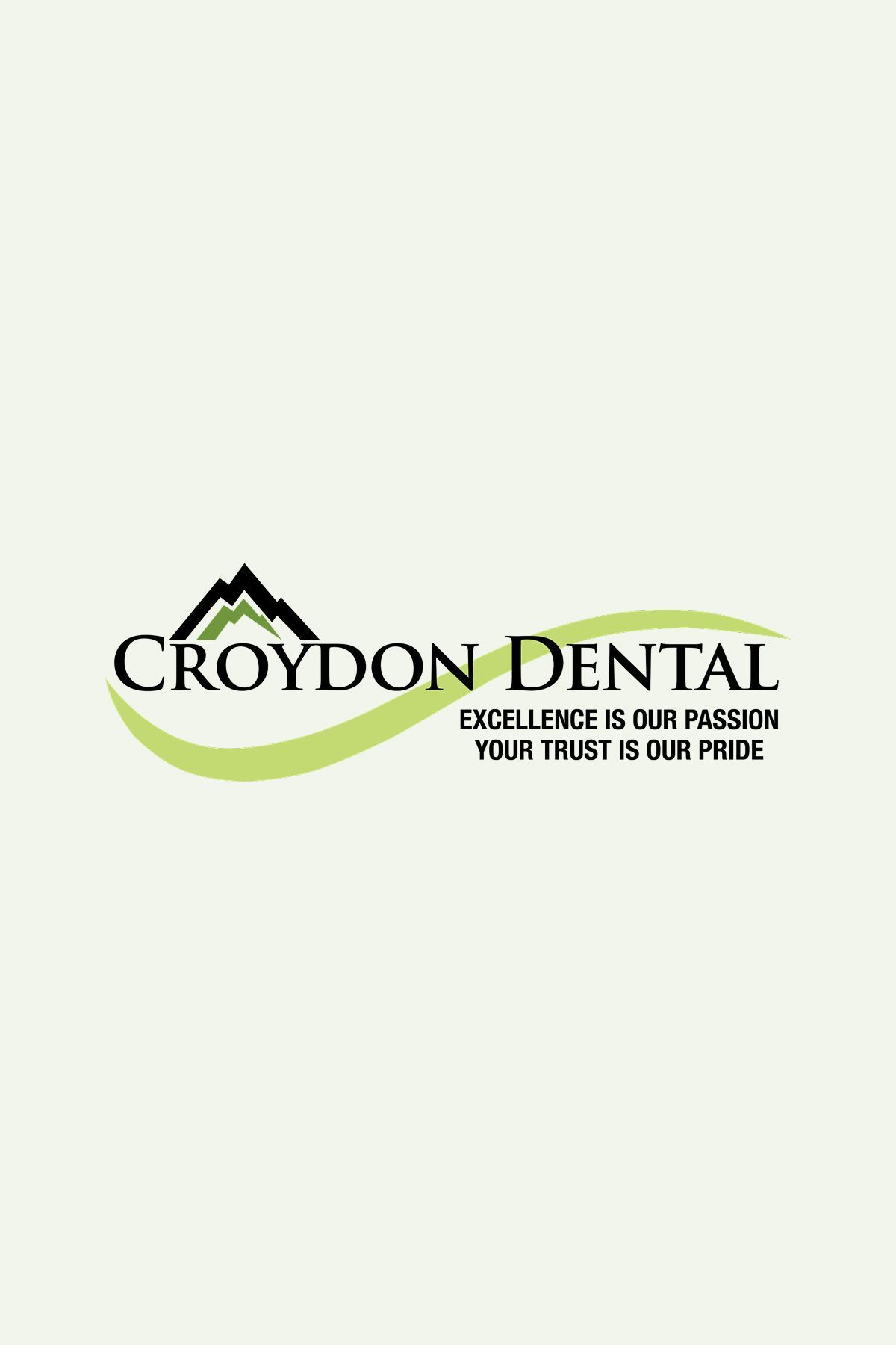 Logo for Croydon Dental featuring stylized mountains above the text with the tagline: Excellence is our passion.