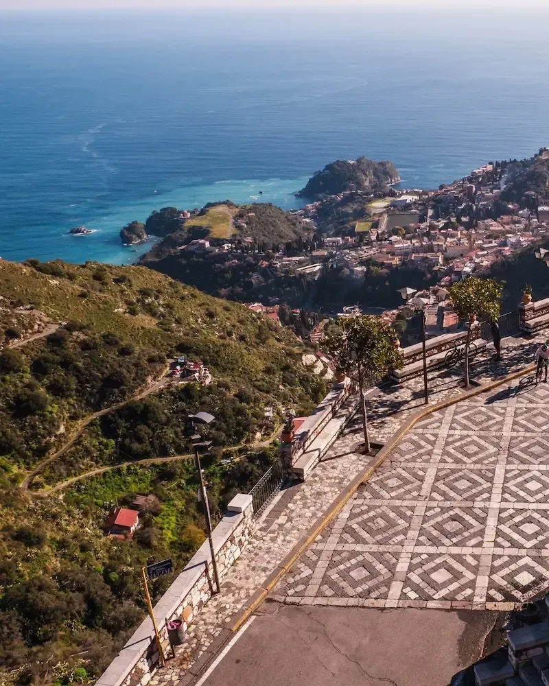 Panoramic view from Castelmola overlooking the Sicilian coast and hillside town