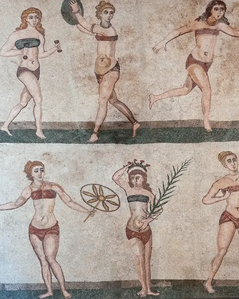 Ancient Roman mosaic from Villa Romana del Casale depicting human figures
