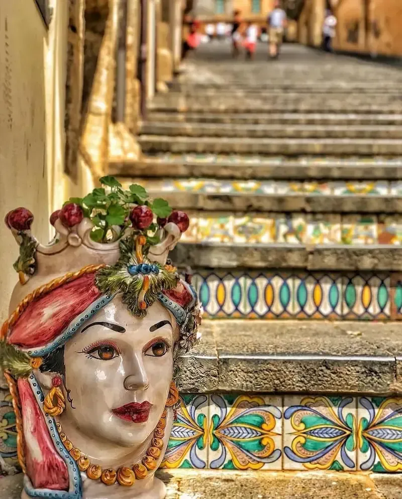 Decorated ceramic staircase in Caltagirone with colorful tiles and flowers