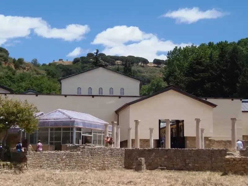 Panoramic view of Piazza Armerina with historic buildings and surrounding hills.