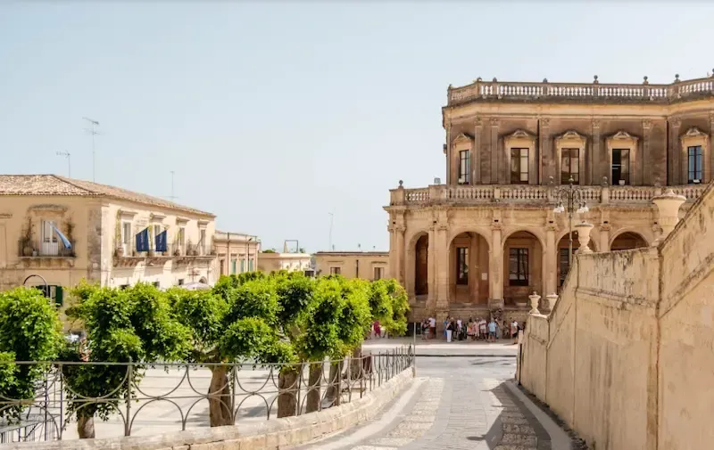 Noto Cathedral and Baroque center, iconic White Lotus location.