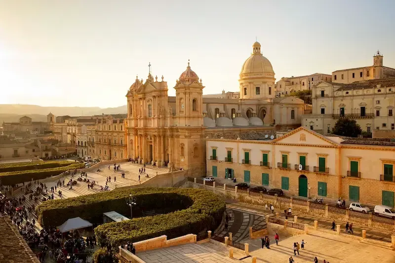 Panoramic view of Noto’s Baroque historic center with domes and golden stone buildings
