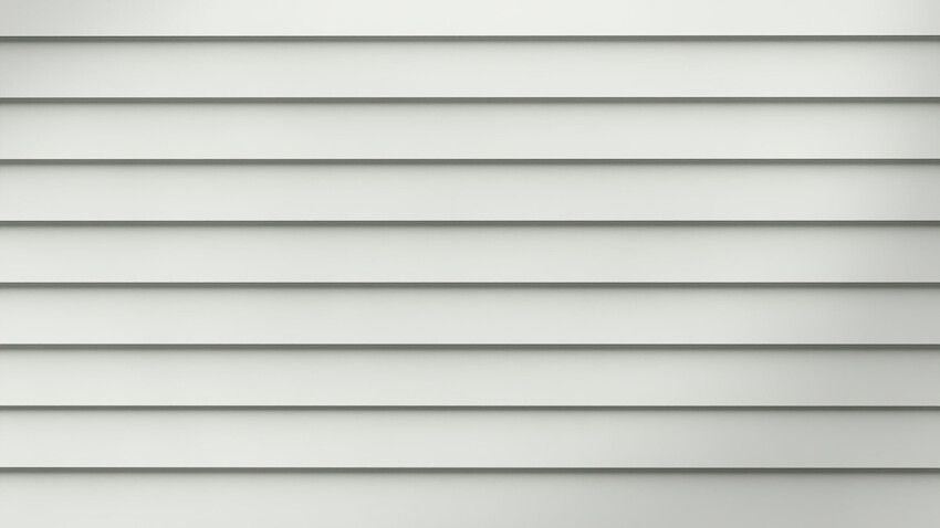 Horizontal rows of white siding on a building's exterior.