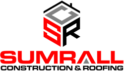 A red , black and gray logo for a construction and roofing company.